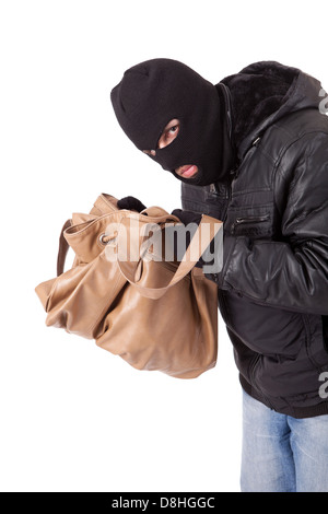 A Thief, stealing a purse Stock Photo