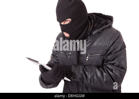 Disguised computer hacker Stock Photo