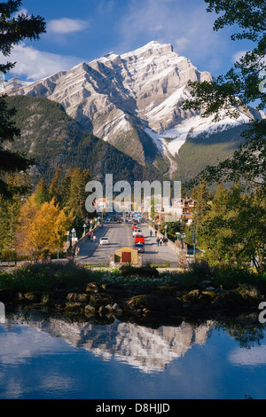 View along Banff Avenue, Cascade Mountain looms above the town of Banff, Banff National Park, Alberta, Canada, North Ame Stock Photo