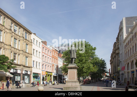 St Anns Square in Manchester city centre, overlooked by the statue of Richard Cobden (1804-65). Stock Photo