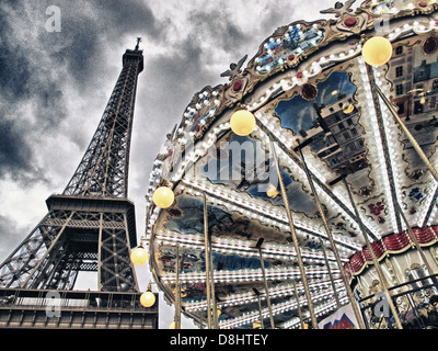 Paris Tour Eiffel Tower Carousel Champ de Mars at Dusk Stock Photo