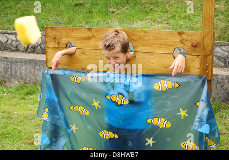 A charity sponge throwing stall at a school fete  in Somerset, England, Uk Stock Photo