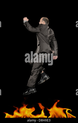 Jumping businessman in action Stock Photo