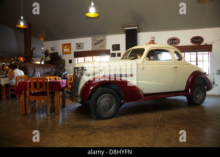 Old Chevrolet, Canon Roadhouse restaurant, near Fish River Canyon, Southern Namibia, Africa Stock Photo