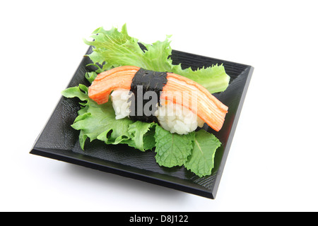 Sushi made from Crab meat on dish,Sushi is a food of Japanese. Stock Photo