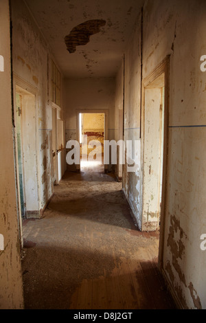 Corridor in abandoned house, Kolmanskop Ghost Town, near Luderitz, Namibia, Africa Stock Photo