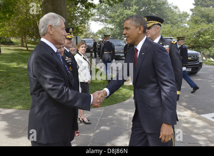 US President Barack Obama is welcomed to Arlington National Cemetery by Secretary of Defense Chuck Hagel May 27, 2013 in Arlington , VA. Stock Photo