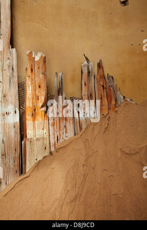 Weathered woodwork in abandoned house, Kolmanskop Ghost Town, near Luderitz, Namibia, Africa