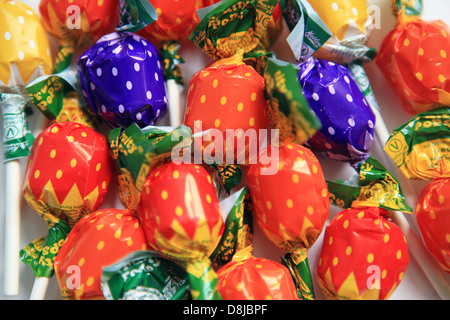 Lollipops with coloured wrappers Stock Photo