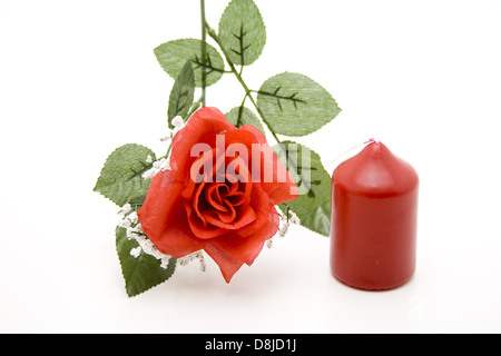 Red rose with candle Stock Photo