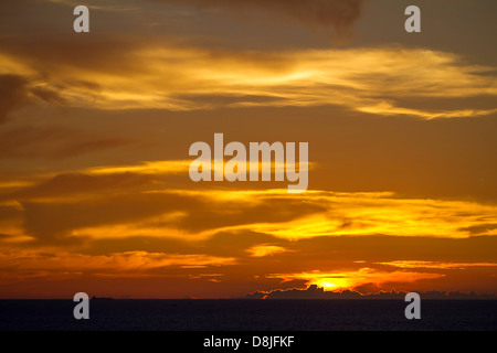 Red sunset sky with dramatic clouds Stock Photo - Alamy