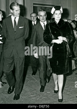 PRINCE PHILLIP at left with Prince Ranier and his wife Princess Grace about 1964 Stock Photo
