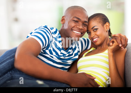 portrait of young afro american couple sitting at home Stock Photo