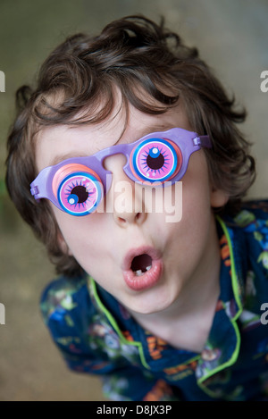 Boy wearing novelty glasses Stock Photo