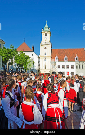 children in traditional costume in the main square, old town hall municipal museum 1421, Bratislava, Slovakia, Europe Stock Photo