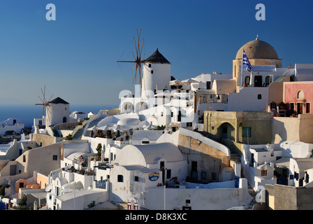 Oia is a community on the islands of Thira (Santorini) and Therasia, in the Cyclades, Greece. Stock Photo