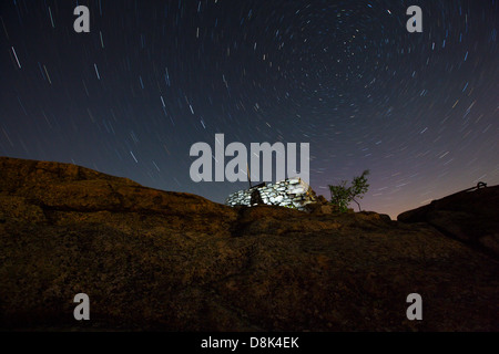 Middle Sister Fire tower on Middle Sister Mountain in Albany, New Hampshire USA during a summer night Stock Photo