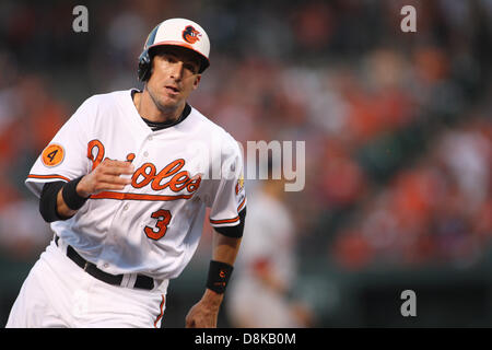 Baltimore Orioles second baseman Ryan Flaherty loses his glove