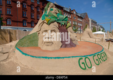 Copenhagen, Denmark. May 30th 2013. 17 sand sculptures of up to 10 metres height built from 3,000 tons sand by 30 international sand artists are on display until August 25th at Havnegade in the port of Copenhagen in one of the most spectacular sand sculpture events in northern Europe. Prize winning 'Go green - Save the Earth' by Sudarsan Pattnaik, India. Global warming affects the whole world. We have to think about how we treat the environment and we have to find a proper way to be in balance with nature. Credit:  Niels Quist / Alamy Live News Stock Photo