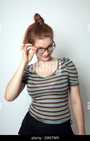 Girl in Striped Top and Glasses Stock Photo