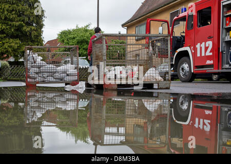 Forth, Germany. 31st May 2013. Sandbags are stacked ready for residents to use to protect against flooding in Forth, Germany, 31 May 2013. After days of rain, the water levels in the river are on the rise. Photo: DANIEL KARMANN/dpa/Alamy Live News Stock Photo