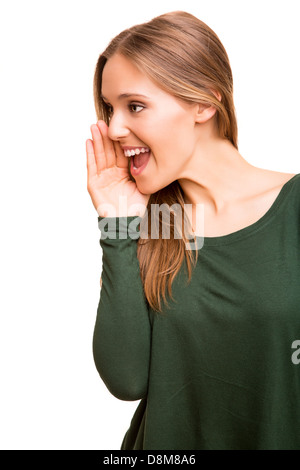 Beautiful blonde woman calling for someone Stock Photo