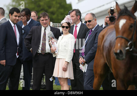 Epsom Downs, UK. 31st May 2013. Owners admire a horse after The Investec Oaks on Investec Ladies Day from Epsom Racecourse. Credit:  Action Plus Sports Images / Alamy Live News Stock Photo