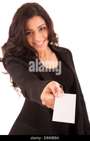 Friendly woman holding a business card and smiling - selective focus on hand Stock Photo