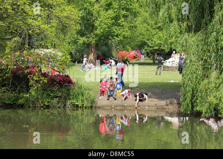 Isabella Plantation, Richmond Park, London, UK. 30th May 2013. Families enjoy a day out in the sunshine surrounded by the beautiful display of flowering azaleas and rhododendrons. Credit:  Jubilee Images/Alamy Live News Stock Photo