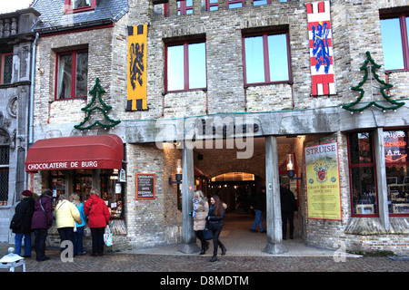 Belgium chocolate shop window display at christmas time, Market place, Bruges City, West Flanders in the Flemish Region of Belgi Stock Photo