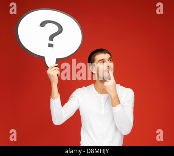 man with question mark in text bubble Stock Photo