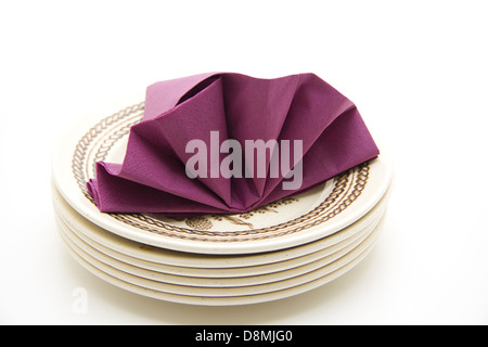 Napkin onto plates Stock Photo