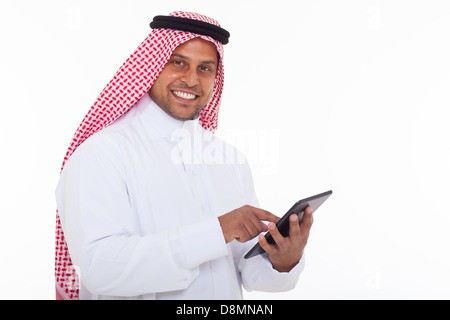 happy arabian man using tablet computer on white background Stock Photo