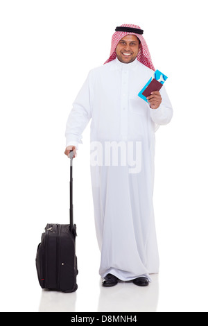 smiling middle eastern man with travel luggage and air ticket isolated on white Stock Photo