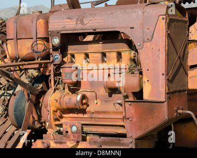 Close up of an old, rusty gasoline engine used to power farm equipment Stock Photo