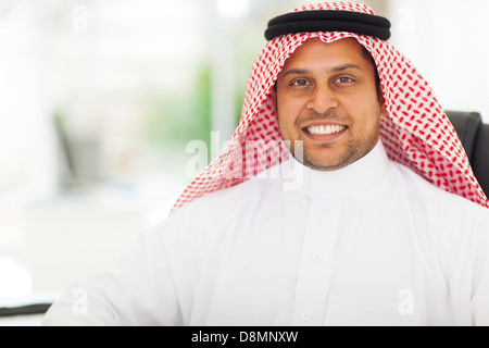 close up portrait of happy middle eastern businessman in office Stock Photo