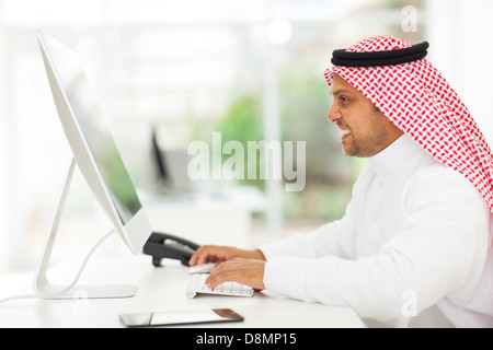 modern arab muslim businessman working on a computer Stock Photo