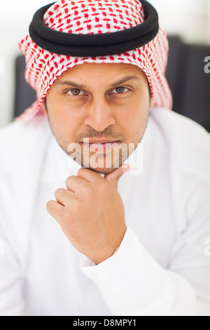 close up portrait of serious middle eastern businessman Stock Photo