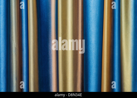 dense textile curtain background with folds Stock Photo