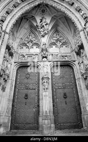 TOLEDO - MARCH 8: South gothic portal of Cathedral Primada Santa Maria de Toledo on March 8, 2013 in Toledo, Spain. Stock Photo