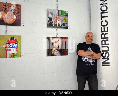 Renown graffiti artist James Sexer Rodriguez paining a mural at 5 ...