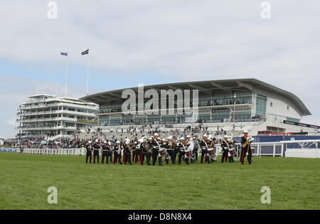 Epsom Downs, Surrey, UK. 1st June 2013.  A marching band pass in front of the granstands on The Investec Derby Day from Epsom Racecourse. Credit:  Action Plus Sports Images/Alamy Live News Stock Photo