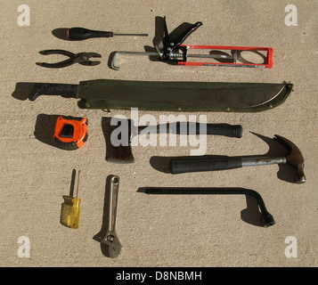 A collection of various tools, including hand tools, power tools, and measuring instruments, displayed for use in different tasks. These tools are essential for construction, maintenance, and repair work. Stock Photo