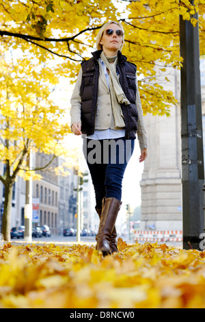 Young woman in autumn, promenade ,Berlin, Germany, Europe Stock Photo