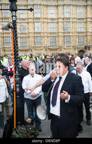 Whitehall, London, UK. 1st June 2013. BNP leader Nick Griffin addresses supporters outside Parliament at the end of a rally. Stock Photo