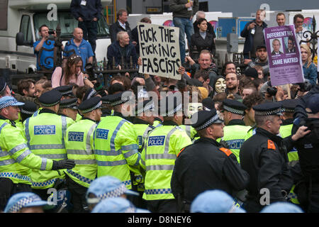 London, UK. 1st June 2013. An anti-fascistposter send its blunt message to the police and BNP in Westminster. Credit:  Paul Davey/Alamy Live News Stock Photo