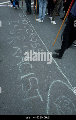 London UK. 1st June 2013. Anti fascist Protesters stage a rally against members of the British Nationalist Party (BNP)  who are holding  a rally at the Palace of Westminster with a large police presence to keep rivals apart. Credit:  amer ghazzal/Alamy Live News Stock Photo