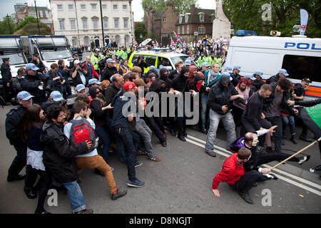 London, UK. 1st June 2013.  Police attempt to keep the UAF and BNP supporters apart. Credit:  nelson pereira/Alamy Live News Stock Photo