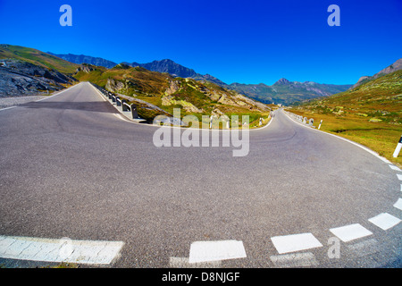 Turning road in Alps mountains. Stock Photo