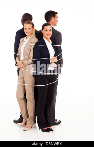 group of business people tied up together Stock Photo